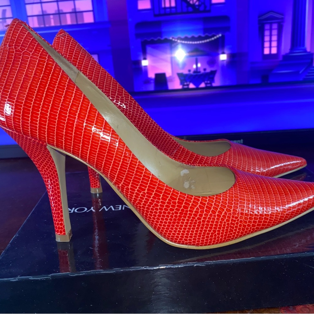 Orange stiletto heels